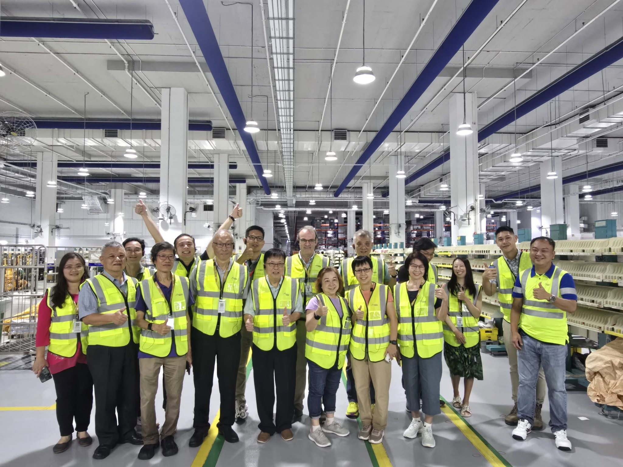 Behind the Mailbox: Stamp Collectors Get an Exclusive Peek into SingPost’s New Automated Sortation Hub