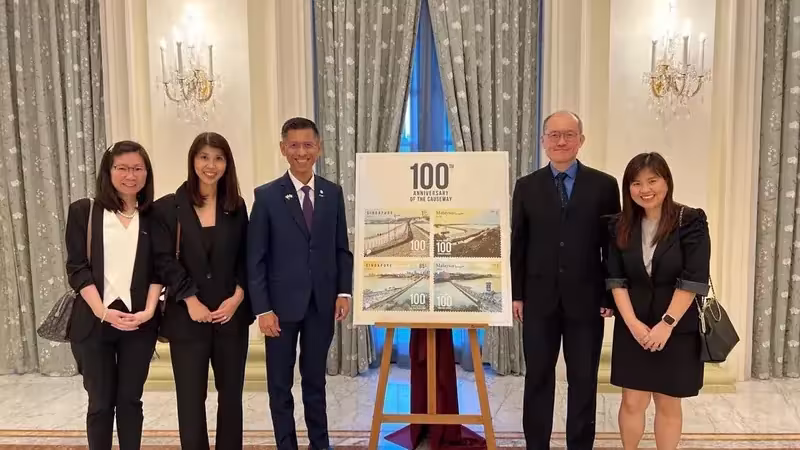 Commemorative stamps marking 100 years of the Causeway unveiled at the Istana